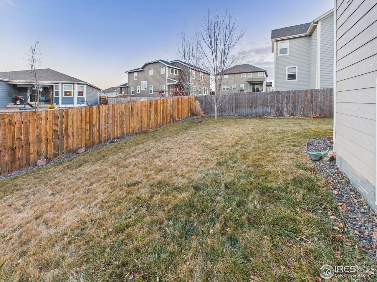 420 South 5th Street Berthoud, CO 80513 - Photo 43 of 47 a view of a house with a yard