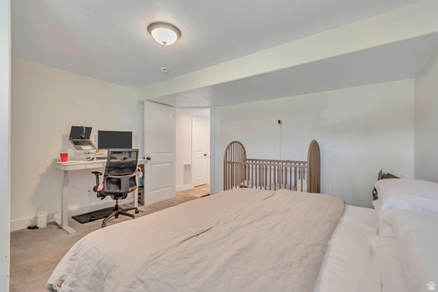 1071 Jamie-Matt Circle Layton, UT 84041 - Photo 7 of 28 Bedroom featuring a desk and light carpet