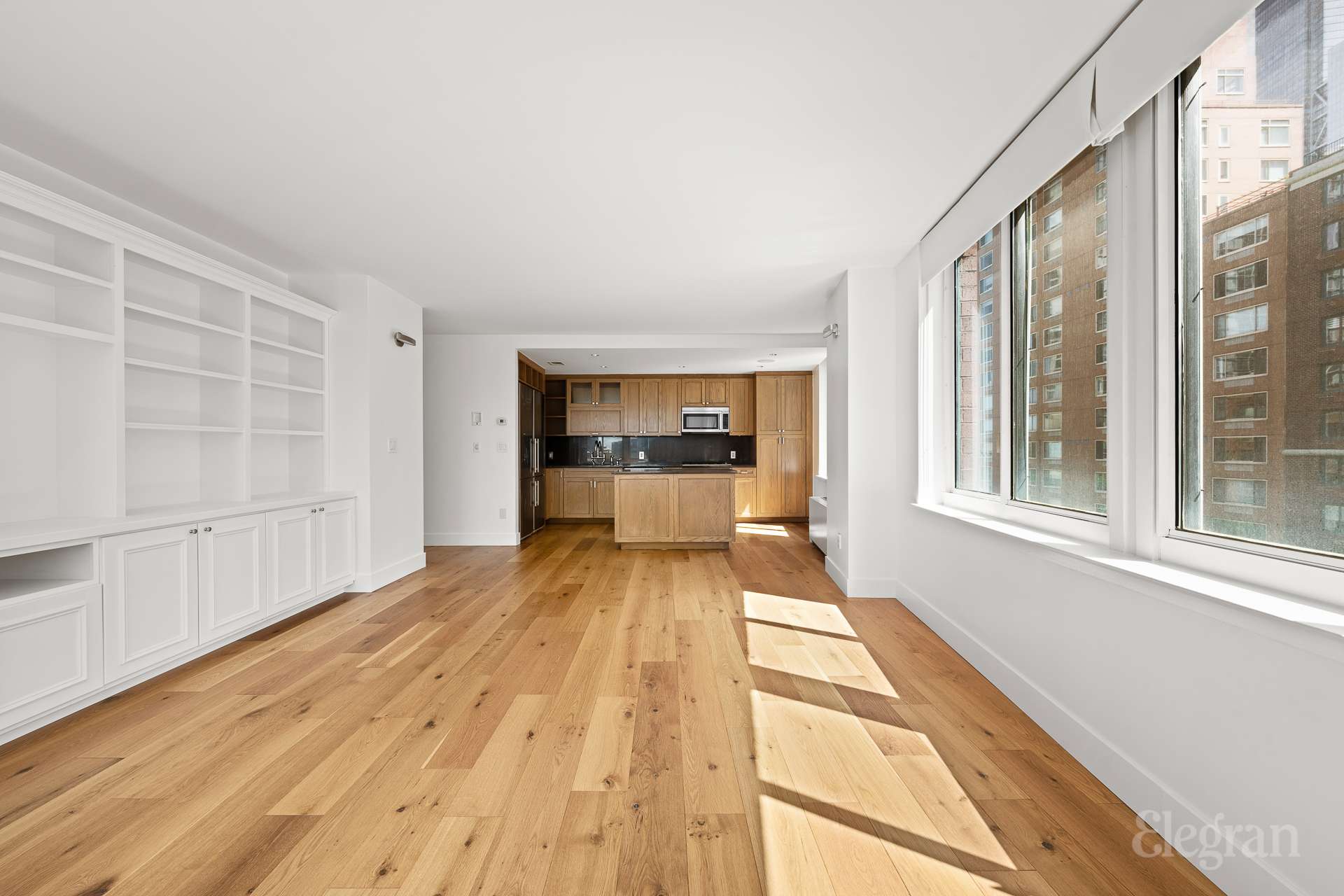 333 Rector Place, Unit 805 Manhattan, NY 10280 - Photo 9 of 28 a view of a living room with a large window