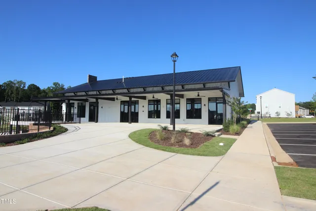 a view of a balcony with chairs