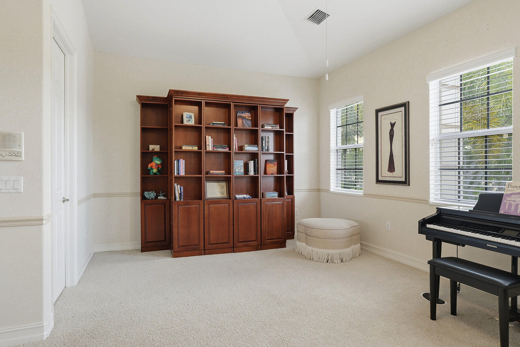8605 Champions Point, Unit 103 Naples, FL 34113 - Photo 34 of 44 a living room with furniture and a toilet