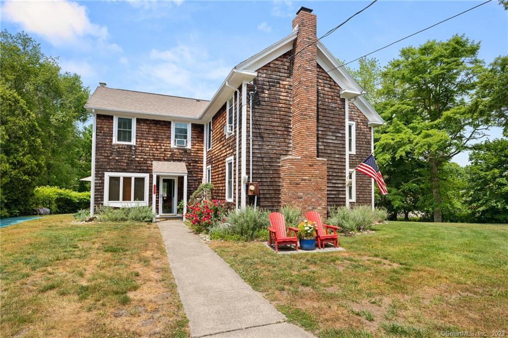 137 Black Point Road East Lyme, CT 06357 - Photo 1 of 1 a front view of house with yard