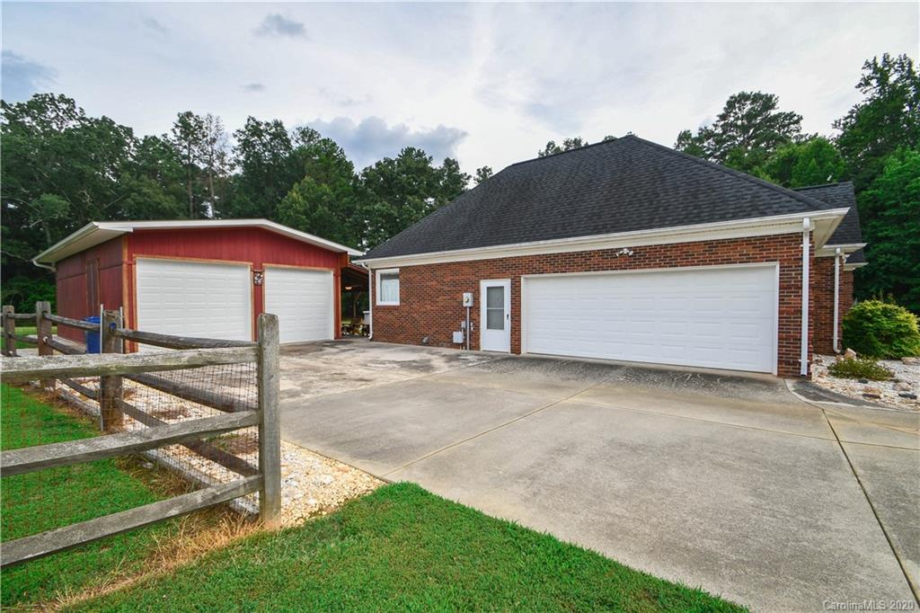 3400 Helms Pond Road Monroe, NC 28110 - Photo 4 of 24 a front view of house with yard and trees in the background