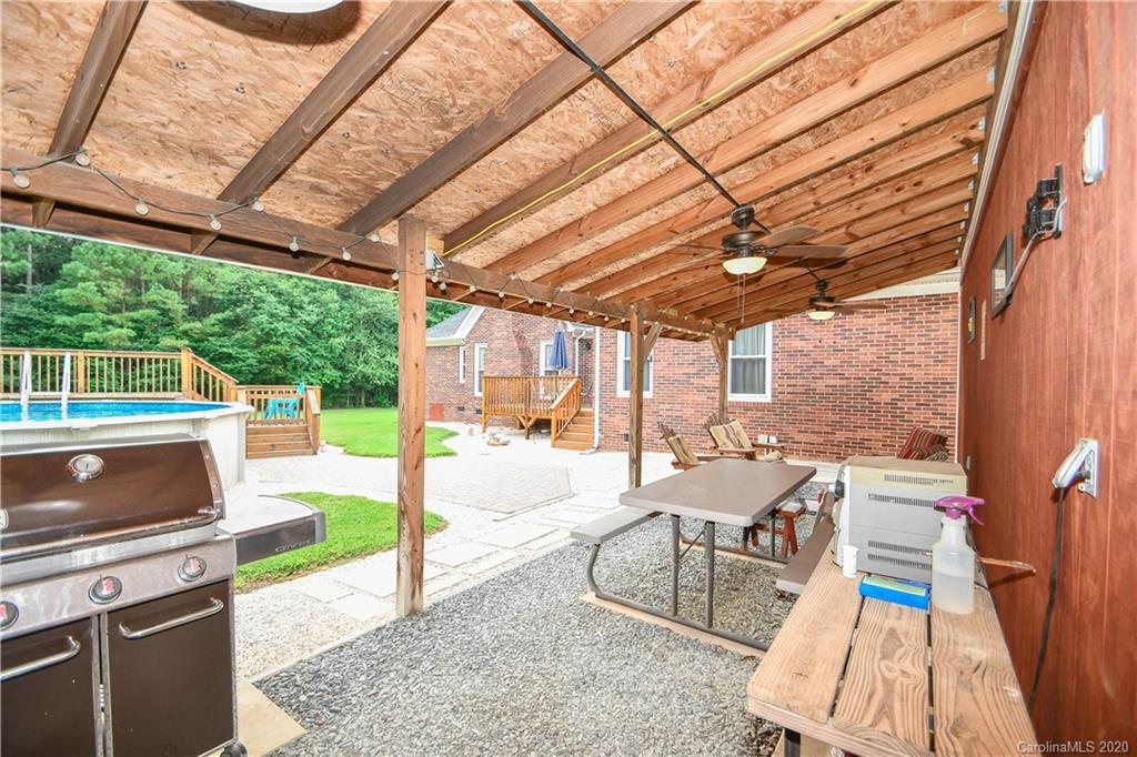 3400 Helms Pond Road Monroe, NC 28110 - Photo 6 of 24 a view of a backyard with sitting area