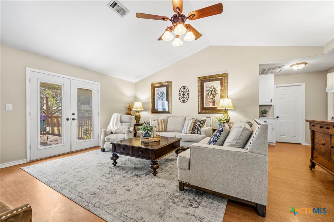11207 Oak Tree Drive Salado, TX 76571 - Photo 4 of 34 Living room - french doors lead to backyard.