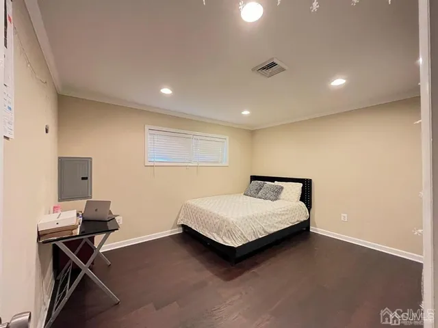 a room with a bed and a desk