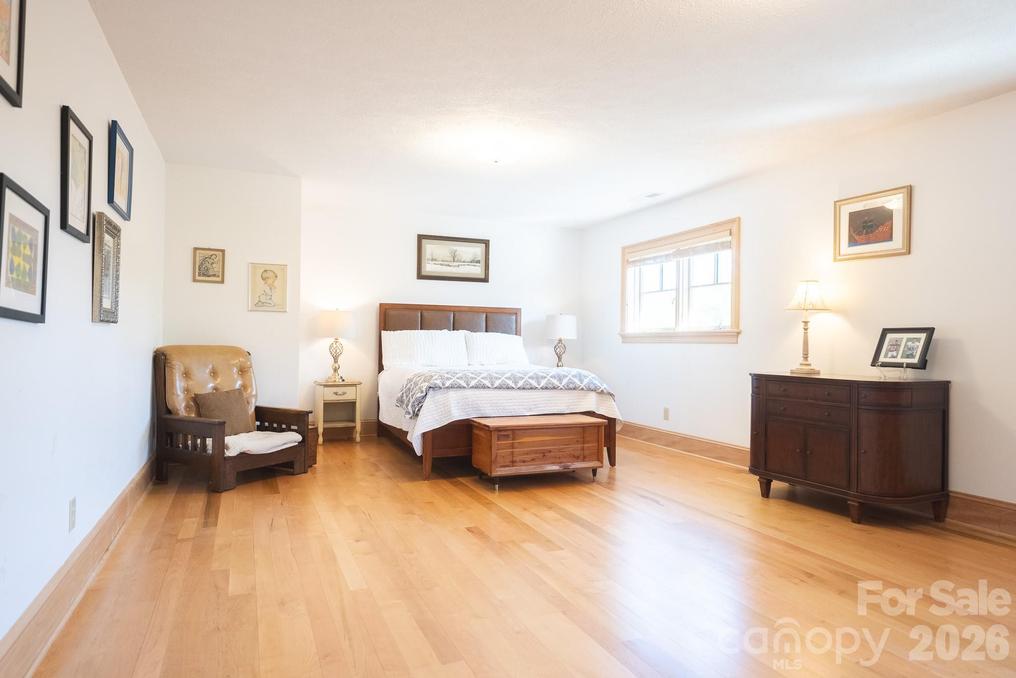 6985 Junaluska Road Boone, NC 28607 - Photo 7 of 35 a bedroom with a bed and a window