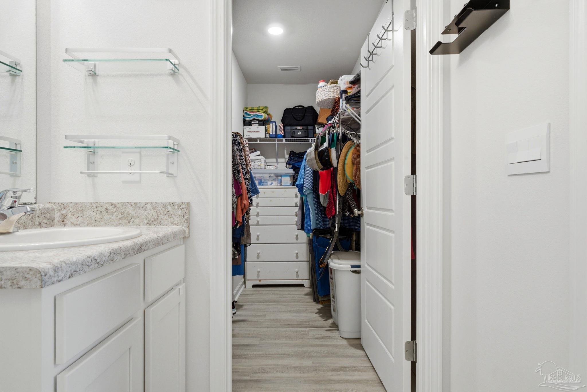 6126 Native Dancer Way Pensacola, FL 32526 - Photo 16 of 40 a view of a walk in closet