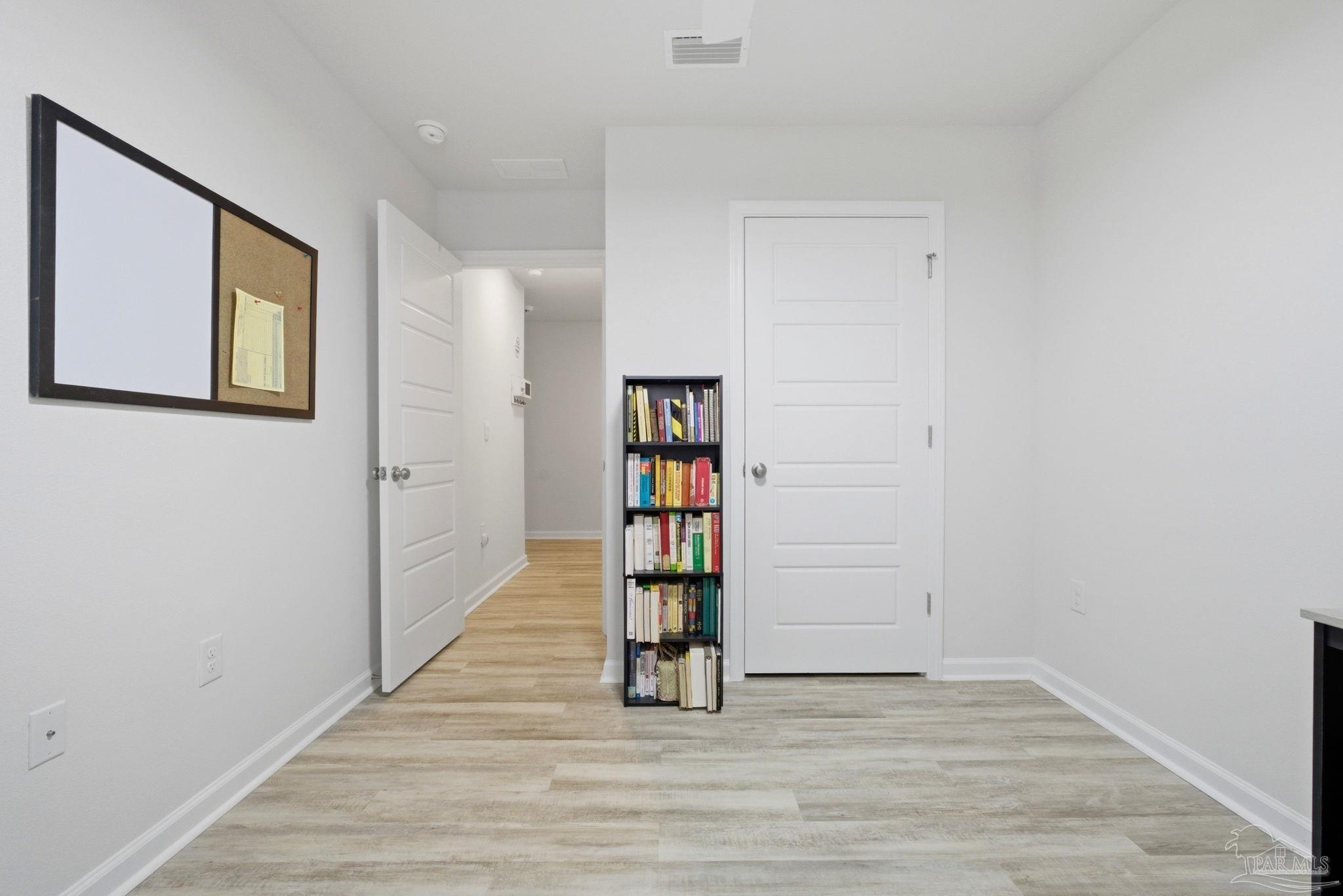 6126 Native Dancer Way Pensacola, FL 32526 - Photo 20 of 40 a view of an entryway with wooden floor