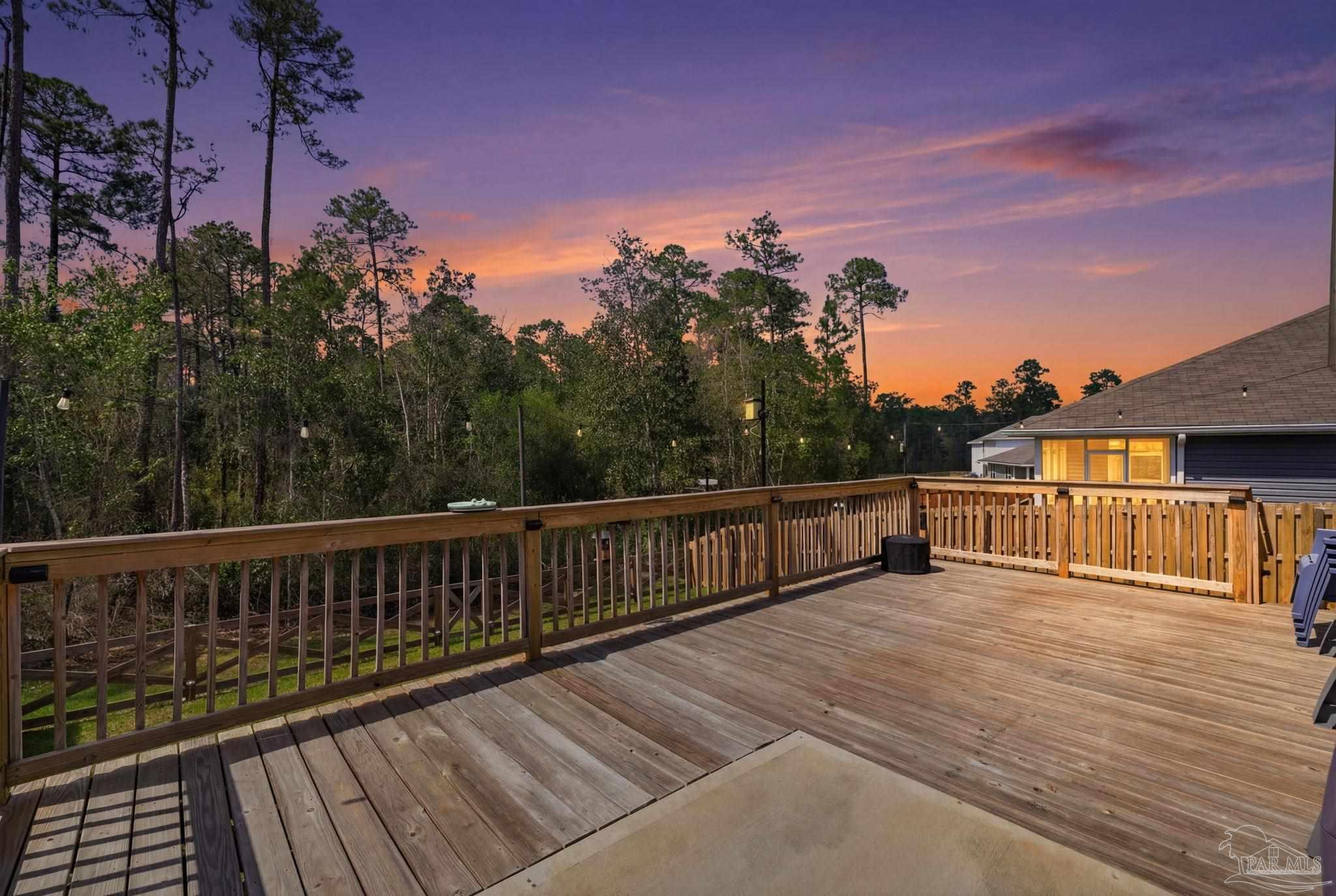 6126 Native Dancer Way Pensacola, FL 32526 - Photo 2 of 40 a view of a house with a wooden deck