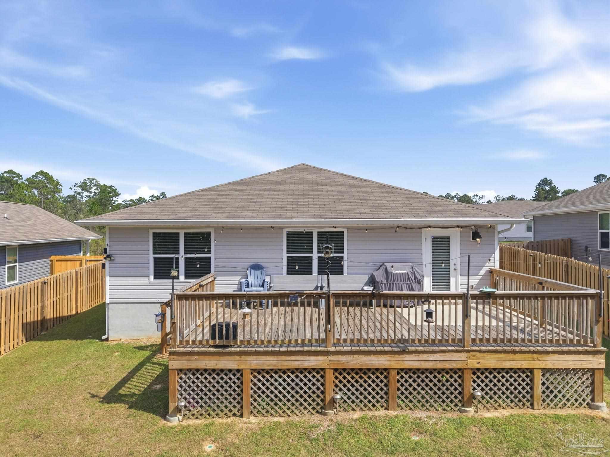 6126 Native Dancer Way Pensacola, FL 32526 - Photo 35 of 40 a view of a house with a deck