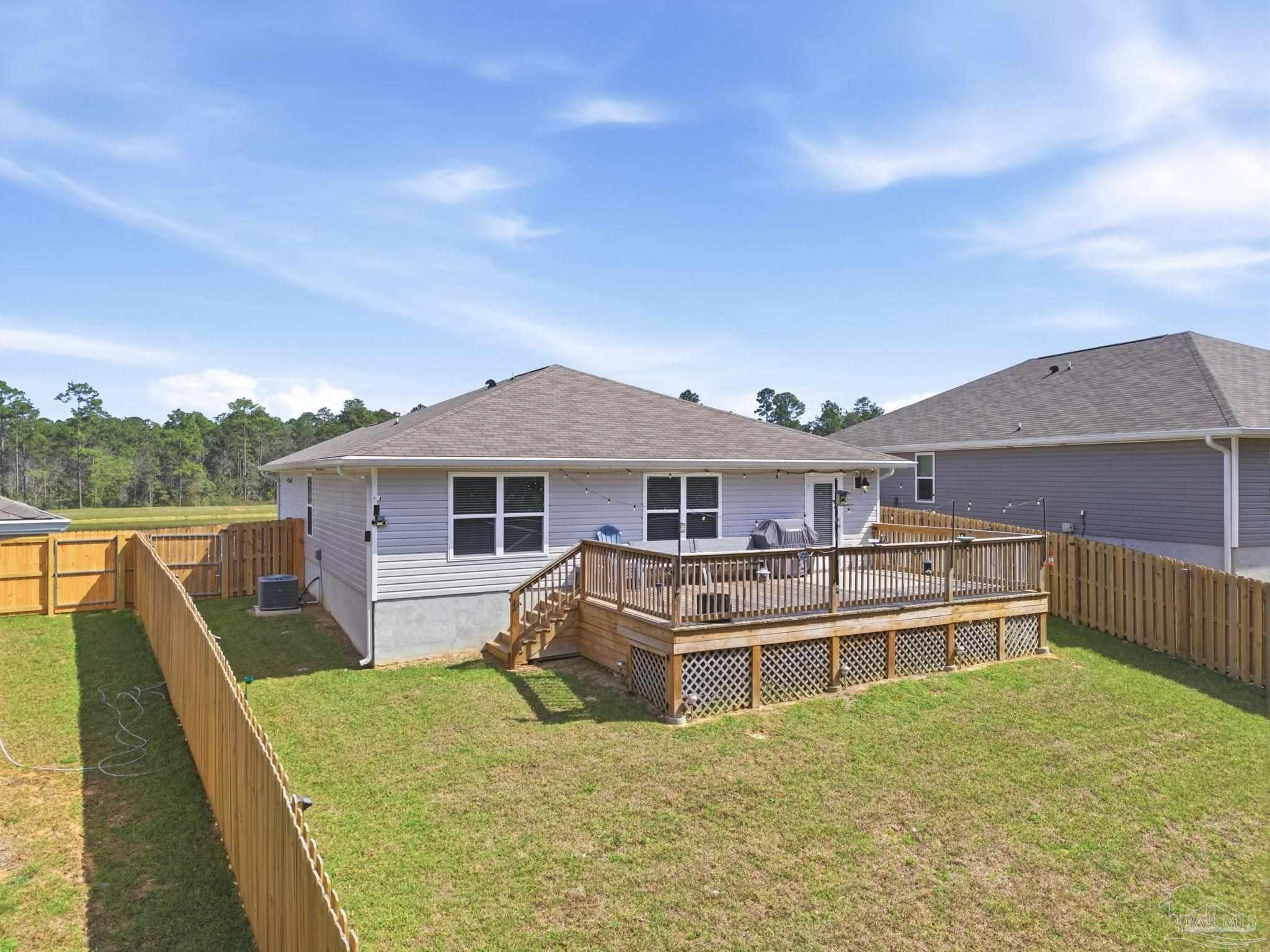 6126 Native Dancer Way Pensacola, FL 32526 - Photo 36 of 40 a front view of a house with a yard