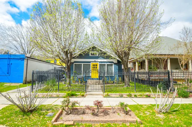 a view of a house with a big yard