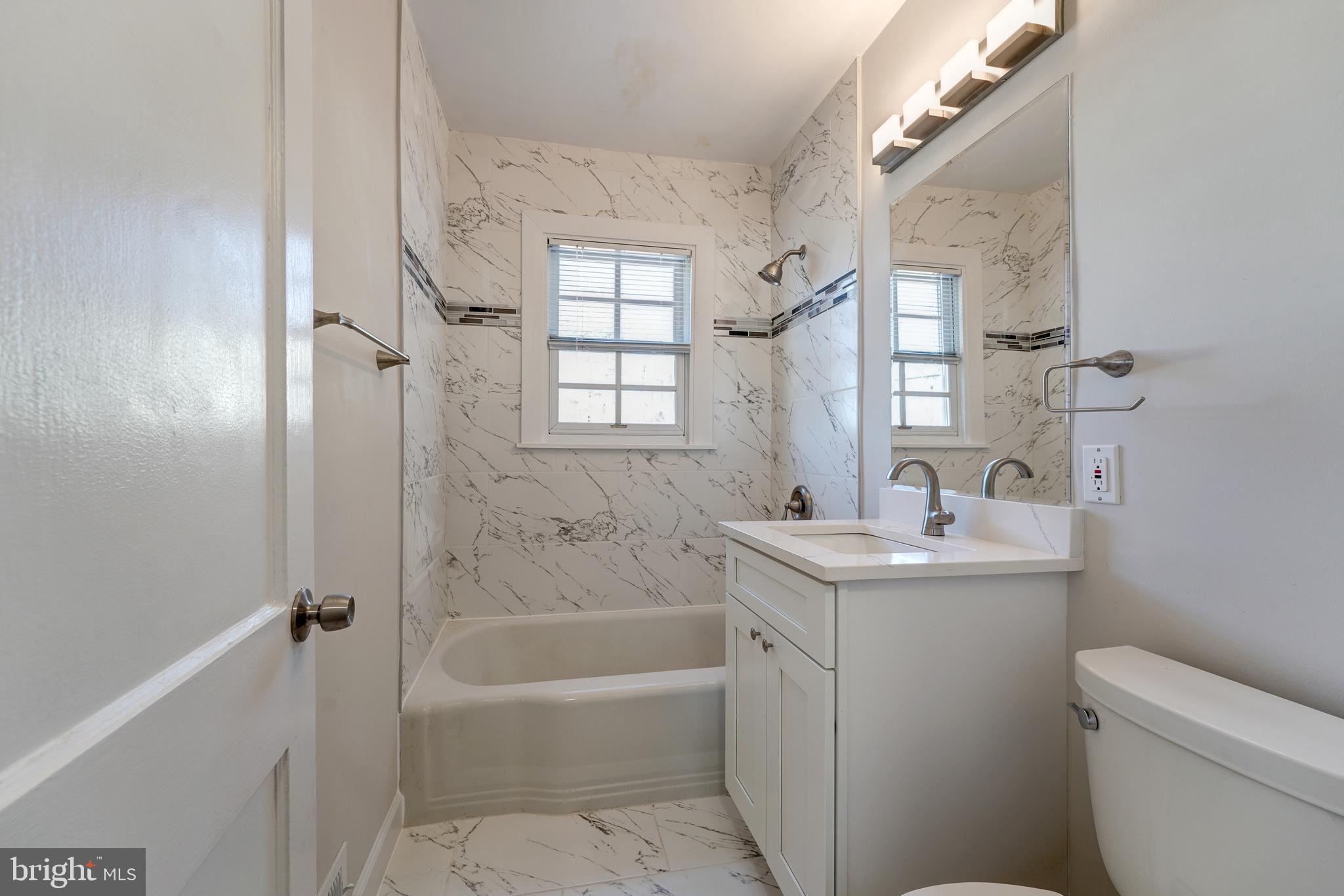 4607 North Carlin Springs Road, Unit A Arlington, VA 22203 - Photo 4 of 26 Main level brand new full bathroom!