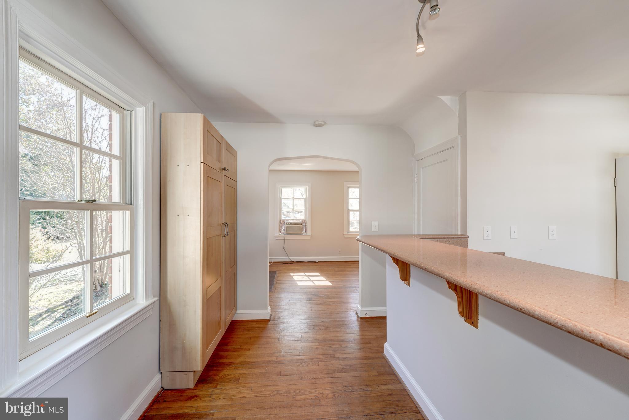 4607 North Carlin Springs Road, Unit A Arlington, VA 22203 - Photo 5 of 26 Large Bar Counter holds 4 stools with large closet