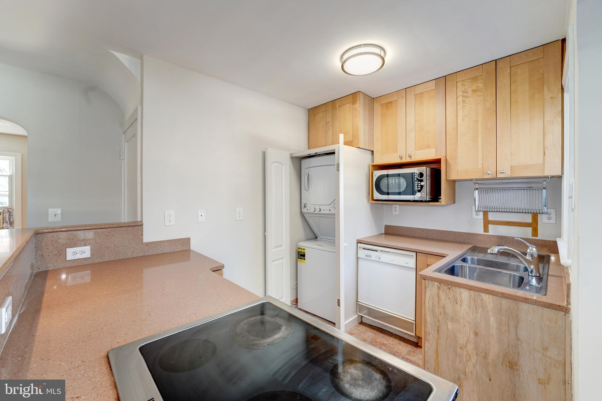 4607 North Carlin Springs Road, Unit A Arlington, VA 22203 - Photo 7 of 26 Roomy maple cabinets; new washer-dryer!