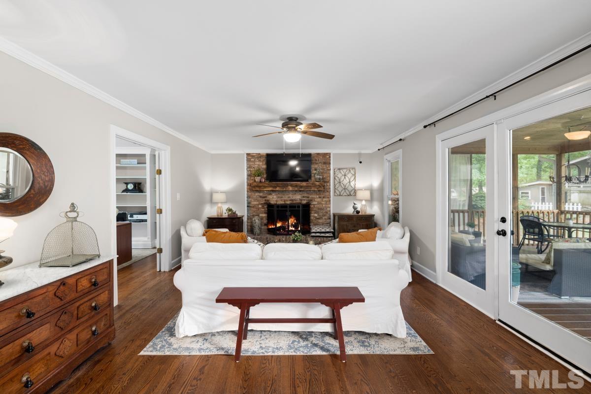 8804 Audley Circle Raleigh, NC 27615 - Photo 15 of 54 a living room with furniture and a fireplace