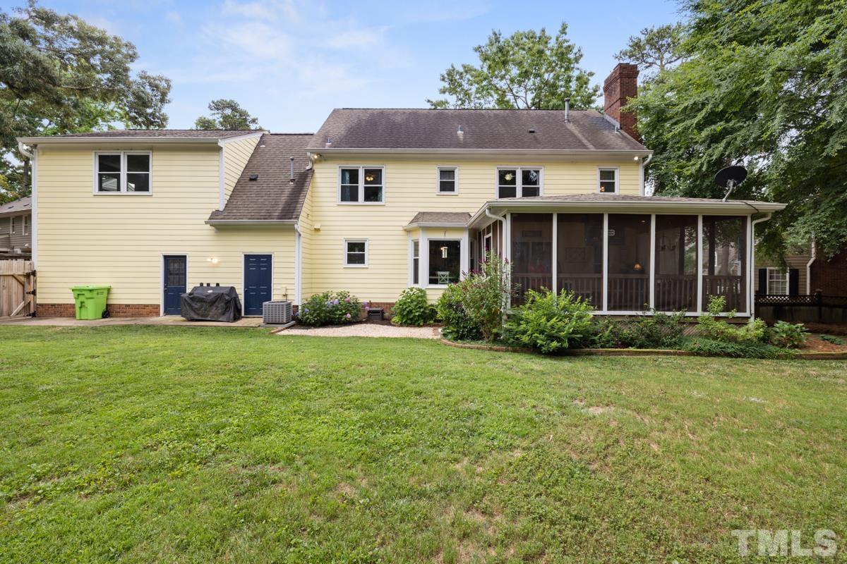 8804 Audley Circle Raleigh, NC 27615 - Photo 43 of 54 a view of a house with backyard and garden