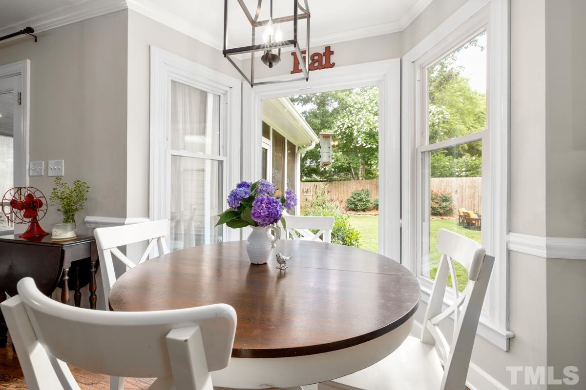 8804 Audley Circle Raleigh, NC 27615 - Photo 8 of 54 a view of a dining room with furniture window and outside view