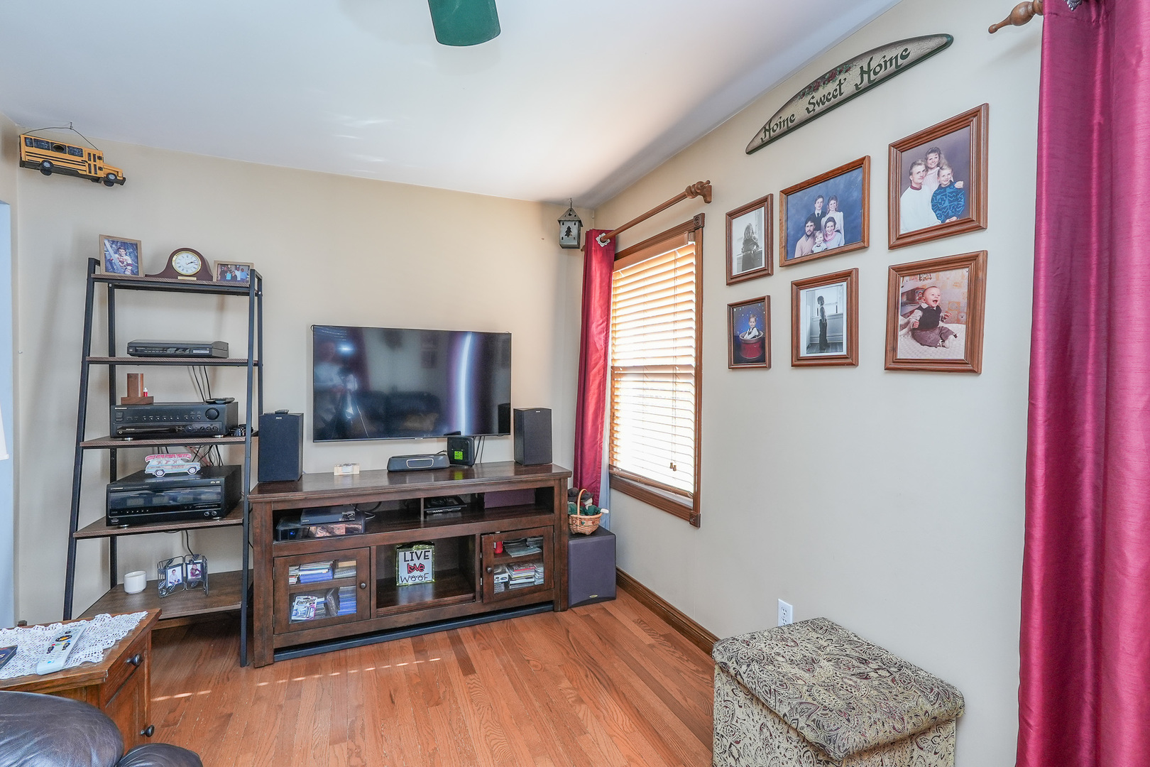 244 West 4th Street Manteno, IL 60950 - Photo 20 of 42 a living room with furniture and a flat screen tv