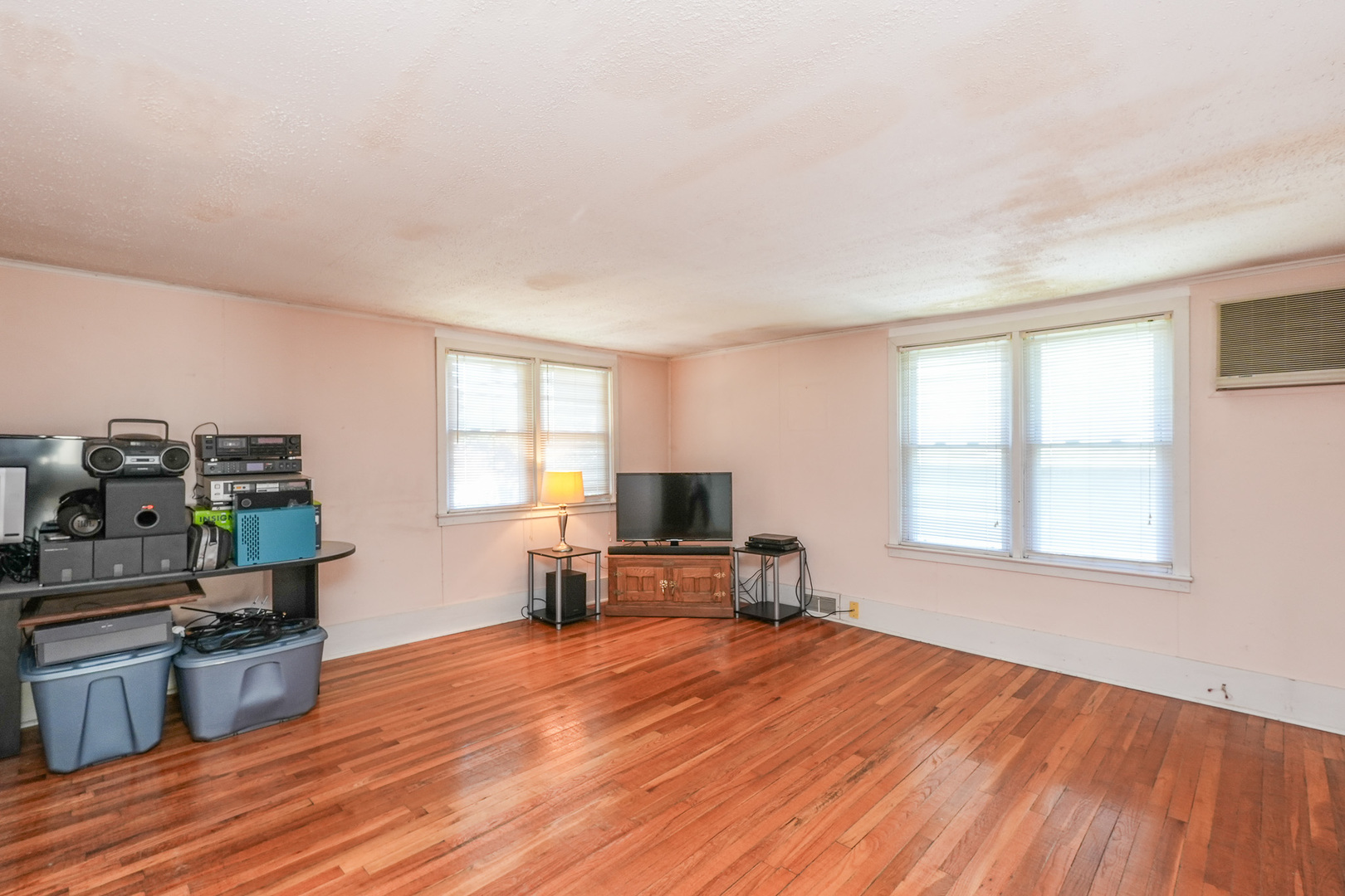 244 West 4th Street Manteno, IL 60950 - Photo 25 of 42 a living room with furniture and a wooden floor