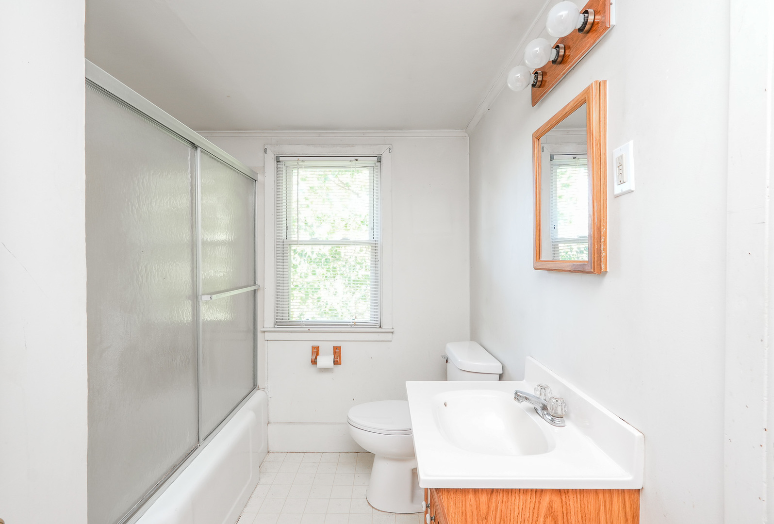 244 West 4th Street Manteno, IL 60950 - Photo 29 of 42 a bathroom with a sink toilet and shower