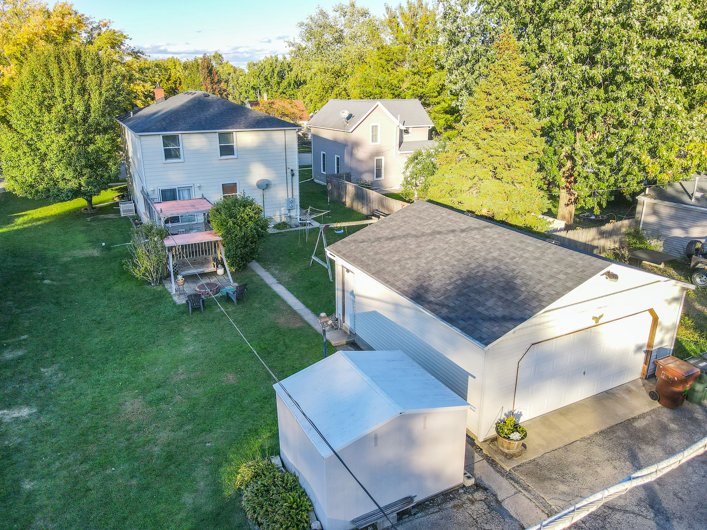 244 West 4th Street Manteno, IL 60950 - Photo 3 of 42 a view of a house with a yard potted plants