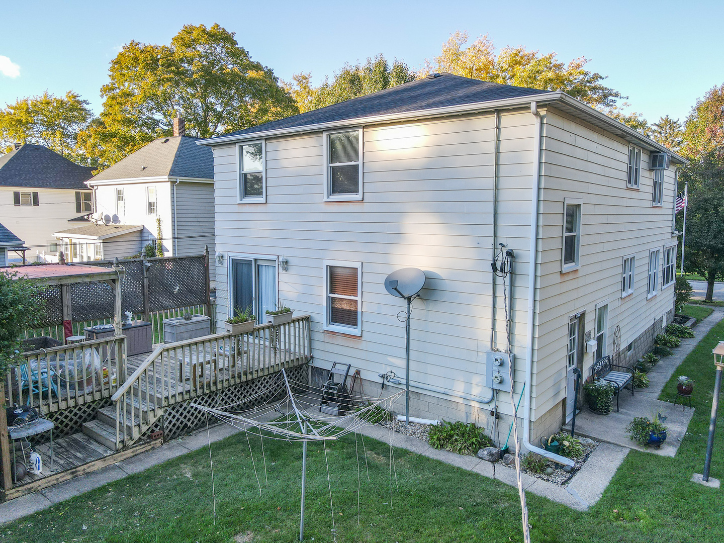 244 West 4th Street Manteno, IL 60950 - Photo 33 of 42 a view of backyard with a garden and deck