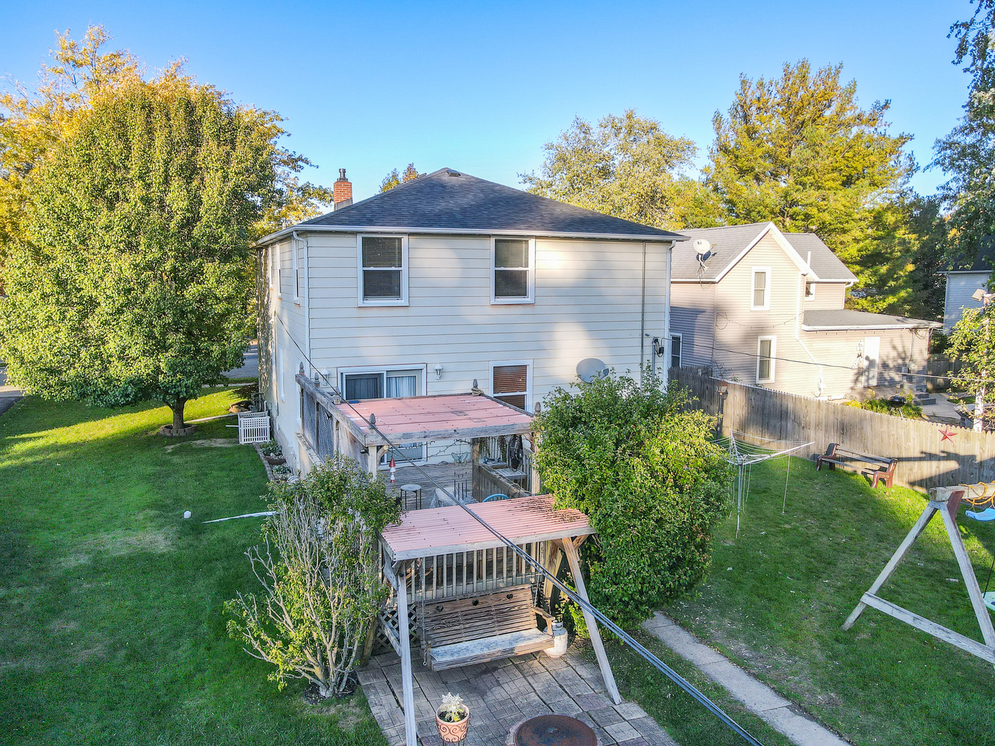 244 West 4th Street Manteno, IL 60950 - Photo 34 of 42 a view of a chair and table in backyard of the house