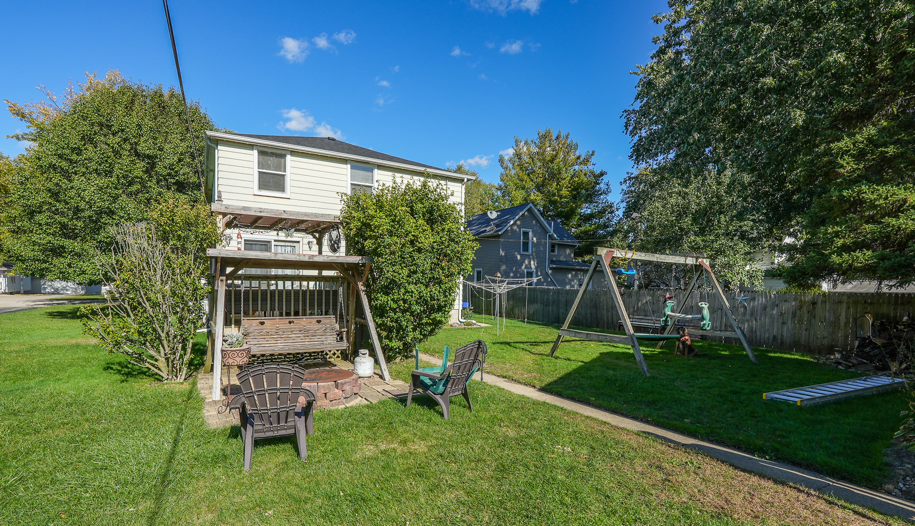 244 West 4th Street Manteno, IL 60950 - Photo 35 of 42 a view of a chair and table in backyard of the house