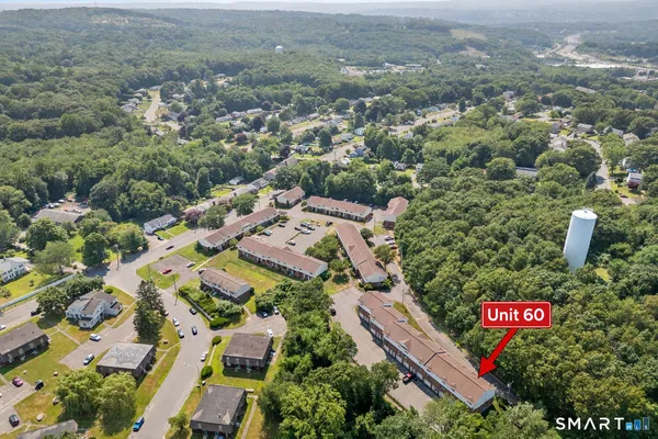 an aerial view of residential house and outdoor space