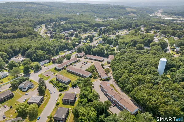 an aerial view of residential house with parking space