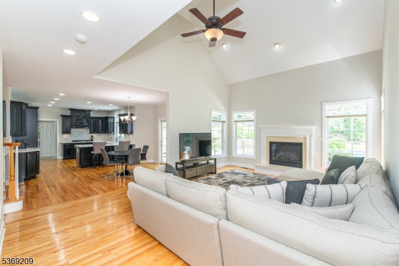6 Perin Place Succasunna, NJ 07876 - Photo 12 of 39 a living room with furniture and a fireplace