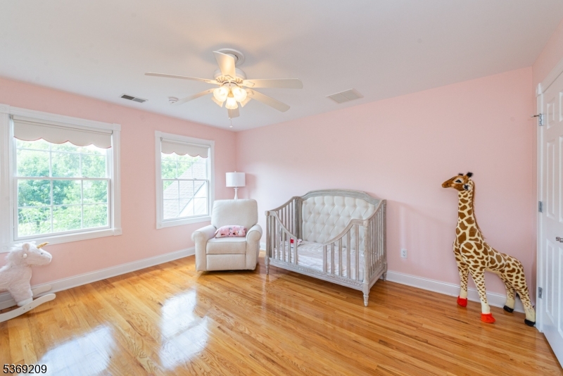 6 Perin Place Succasunna, NJ 07876 - Photo 25 of 39 a view of livingroom with furniture window and wooden floor