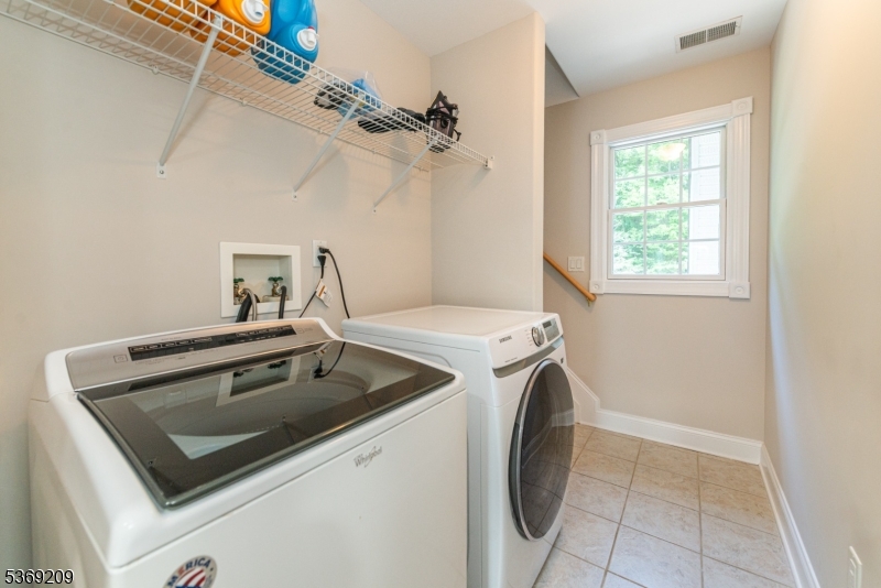 6 Perin Place Succasunna, NJ 07876 - Photo 29 of 39 a utility room with sink dryer and washer