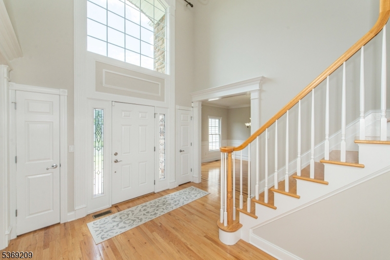 6 Perin Place Succasunna, NJ 07876 - Photo 3 of 39 a view of entryway and hall with wooden floor
