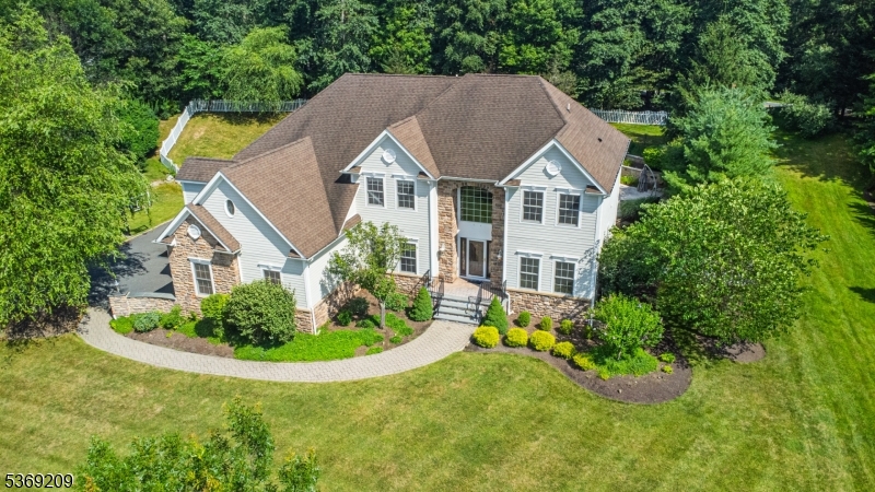 6 Perin Place Succasunna, NJ 07876 - Photo 37 of 39 a aerial view of a house with swimming pool next to a yard