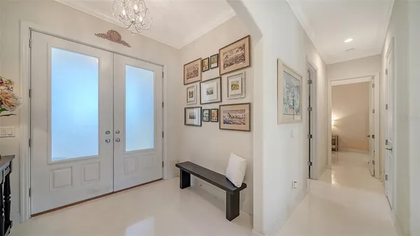 a large kitchen with a table and chairs
