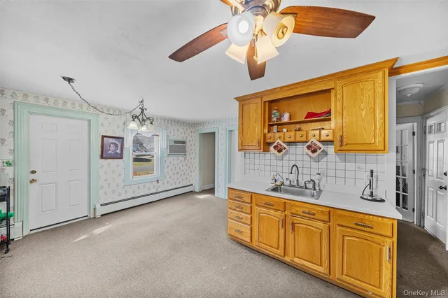 a bathroom with a double vanity sink a mirror and a shower