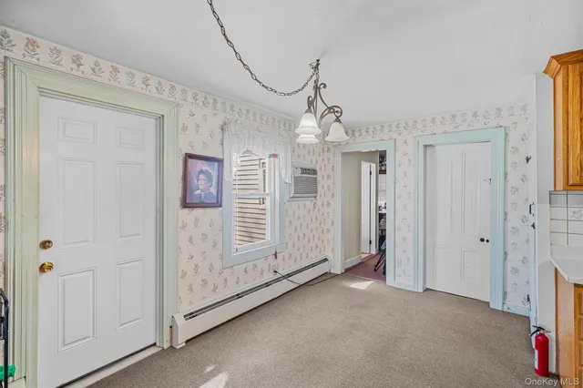 a view of a hallway with entryway