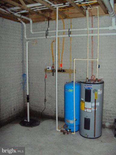 3119 Whiteford Road Pylesville, MD 21132 - Photo 11 of 17 Well pump, water heater, sump pump & gas manifold