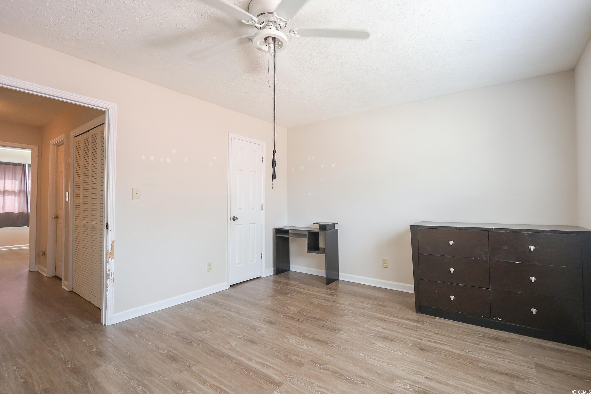 1025 Carolina Road, Unit O4 Conway, SC 29526 - Photo 12 of 22 Interior space featuring baseboards, light wood-st