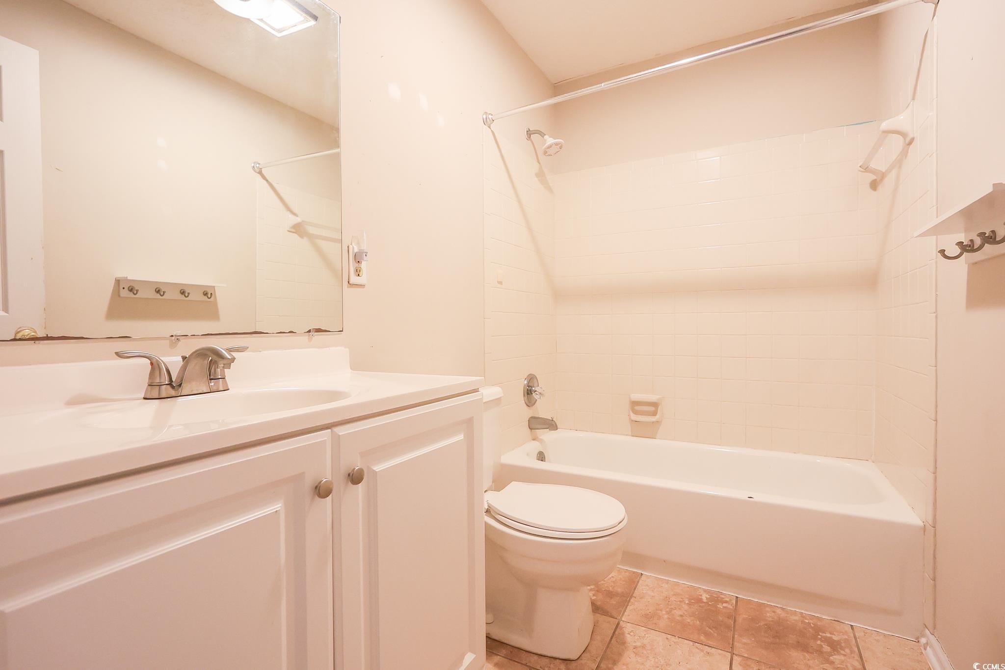1025 Carolina Road, Unit O4 Conway, SC 29526 - Photo 16 of 22 Full bath with vanity, tile patterned floors, toil
