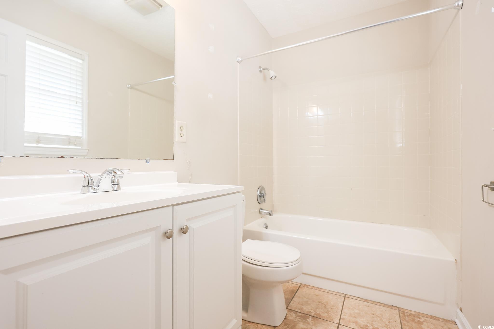 1025 Carolina Road, Unit O4 Conway, SC 29526 - Photo 9 of 22 Bathroom featuring vanity, visible vents, tile pat