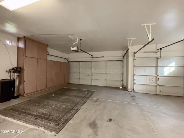 a view of the cars park in front of building