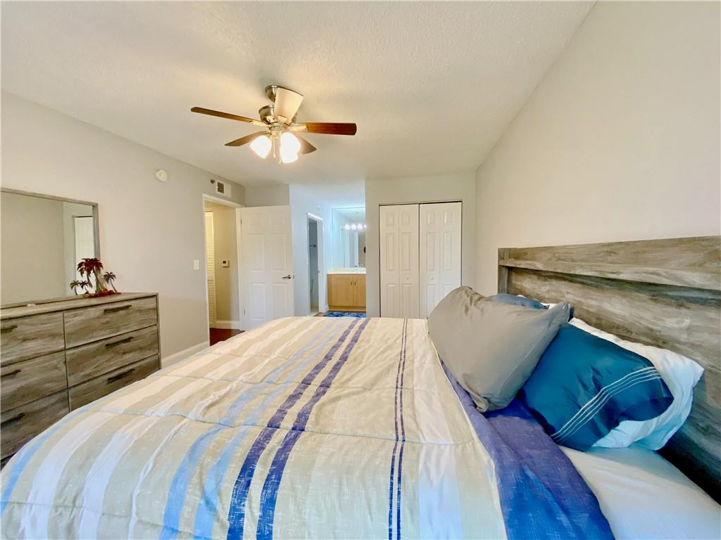 3207 Clint Moore Road, Unit 104 Boca Raton, FL 33496 - Photo 13 of 27 Master Bedroom