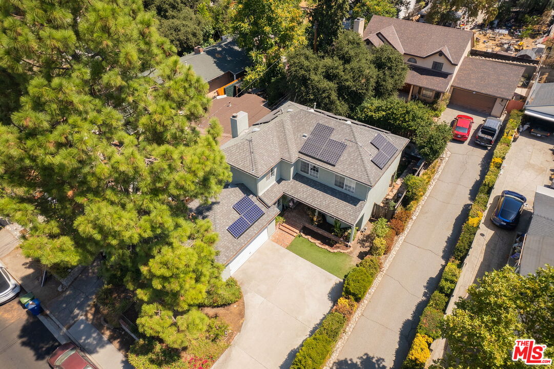 10526 Samoa Avenue Tujunga, CA 91042 - Photo 3 of 7 an aerial view of a house with a yard basket ball court and outdoor seating