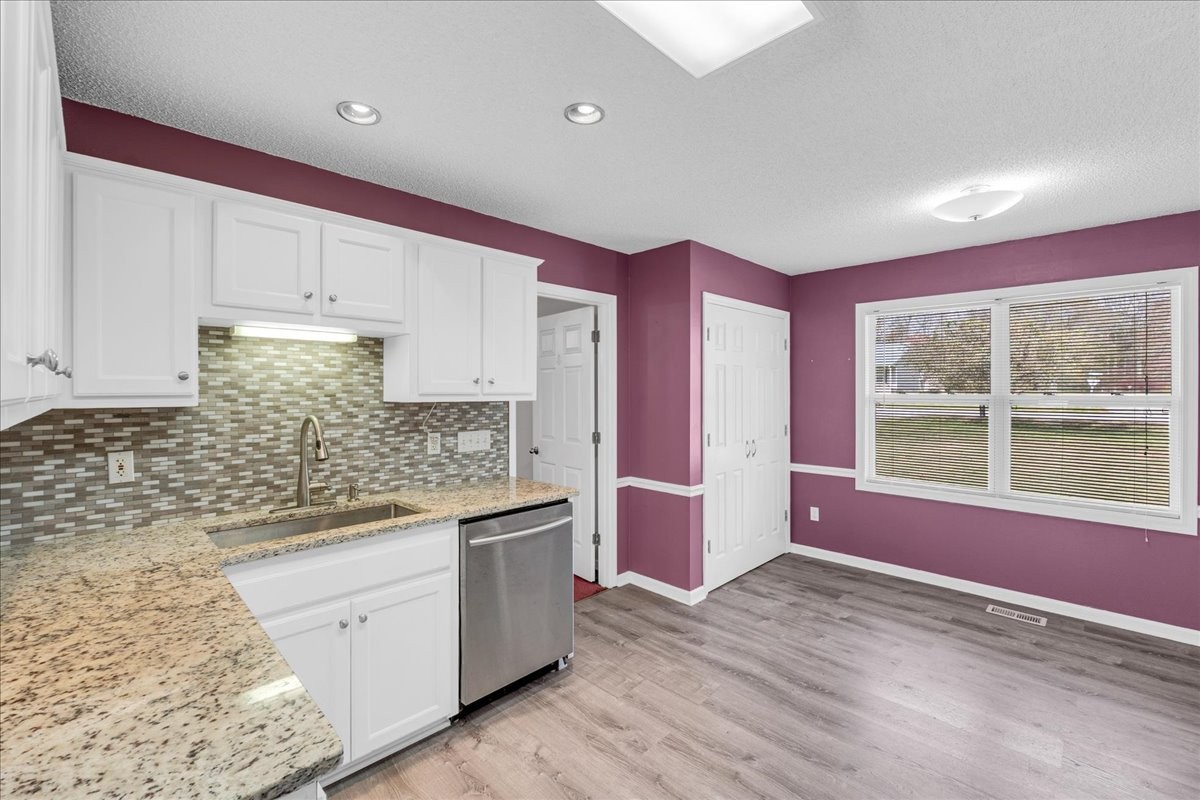 99 Arrowhead Drive Manchester, TN 37355 - Photo 14 of 39 a kitchen with stainless steel appliances granite countertop a granite counter tops and a window