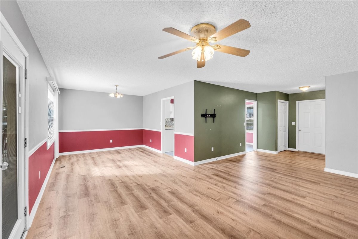 99 Arrowhead Drive Manchester, TN 37355 - Photo 19 of 39 a view of an empty room with wooden floor
