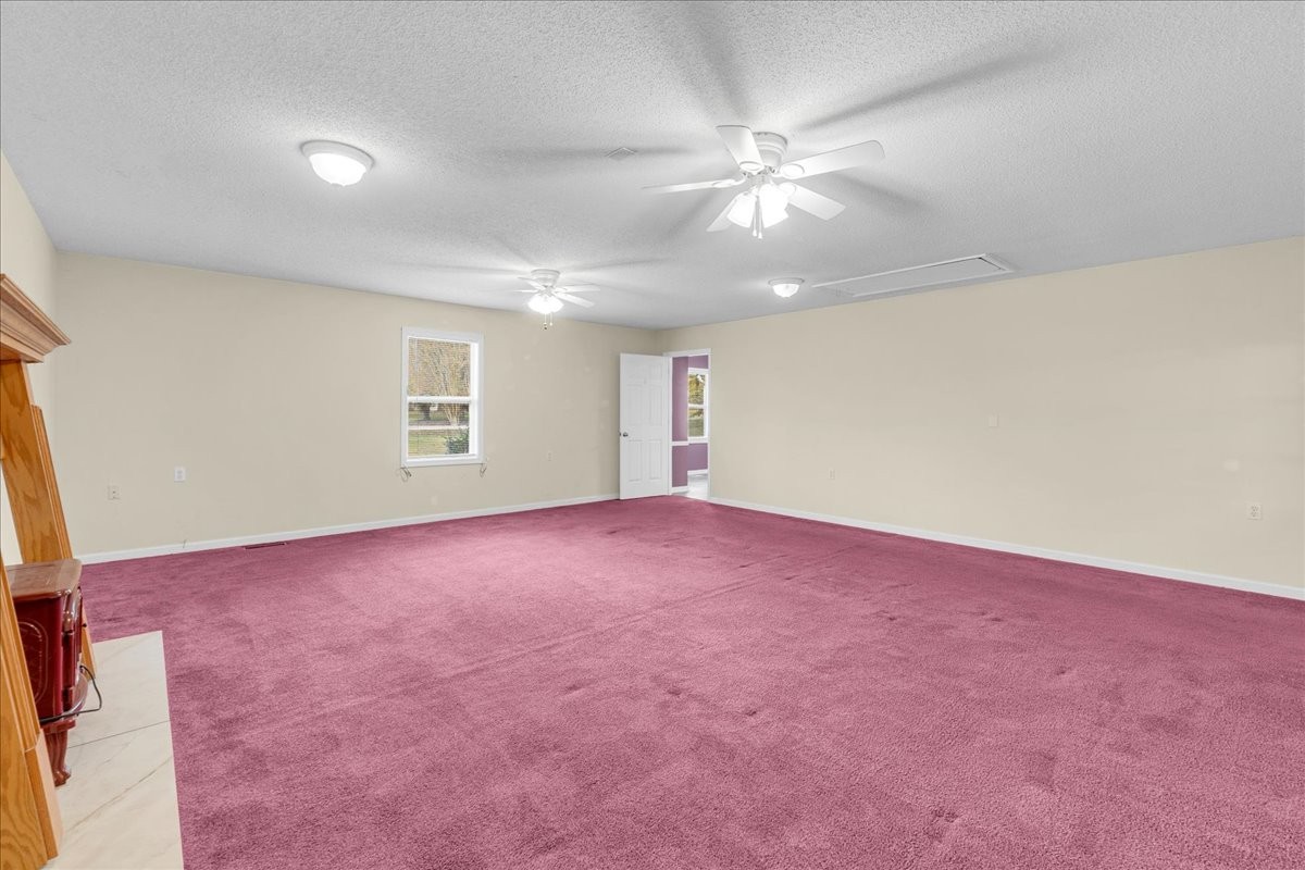 99 Arrowhead Drive Manchester, TN 37355 - Photo 30 of 39 an empty room with windows and fan